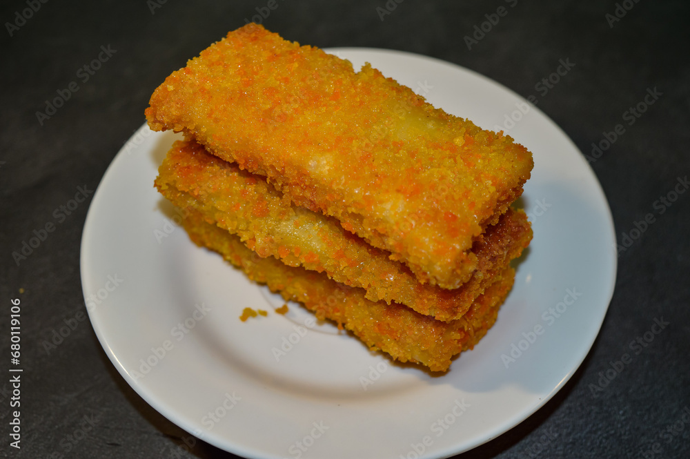 Risoles Mayonnaise or Risol Mayo, Indonesian street food made from flour shell filled with mayonnaise and sausage. selective focus. Risoles Mayonnaise or Risol Mayo, Indonesian street food made from flour shell filled with mayonnaise and sausage. selective focus.