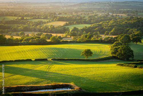 Hilltop view of beautiful sunset over the rural Dorset nearby the village of Hilfield, England