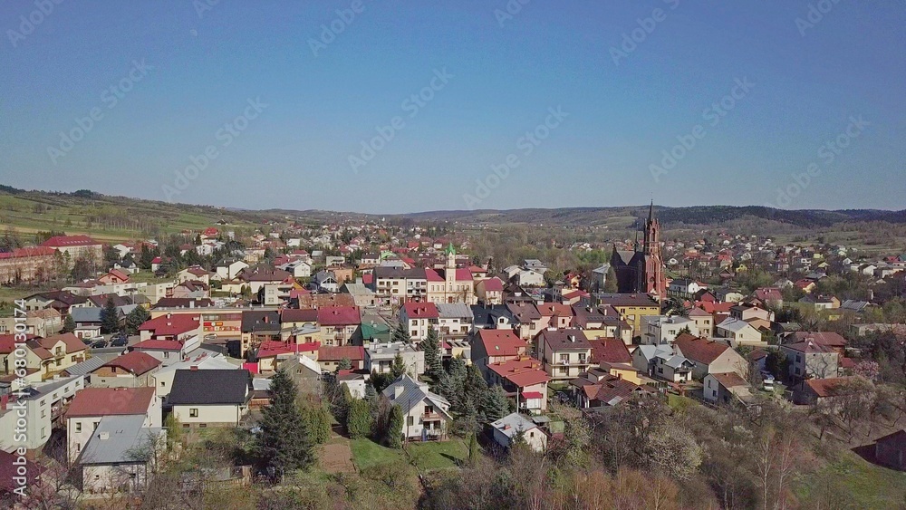Fototapeta premium Kolaczyce, Poland - 9 9 2018: Photograph of the old part of a small town from a bird's flight. Aerial photography by drone or quadrocopter. Advertise tourist places in Europe. Planning a 