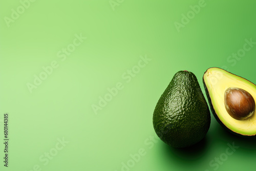 Avocado on green background
