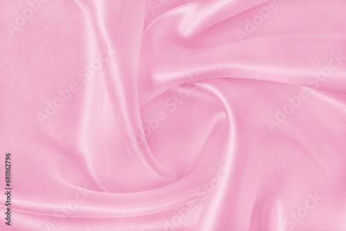 Pink fabric cloth texture for background and design art work, beautiful crumpled pattern of silk or linen.
