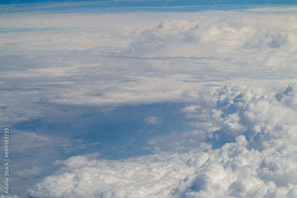 above the clouds, view above clouds from airplane window, flight, by airplane above the clouds, view above clouds from airplane window, flight, by airplane