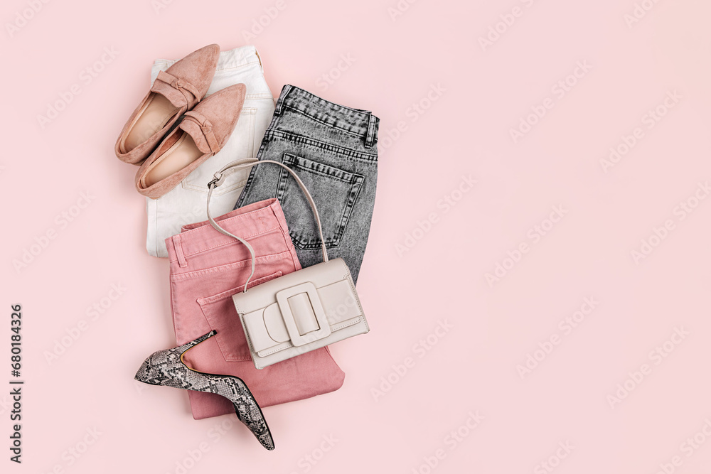 Jeans, handbag and  loafers. Fashion spring, summer or autumn outfit. Women's stylish and elegant clothes with accessory.  Flat lay, top view, overhead. - obrazy, fototapety, plakaty 