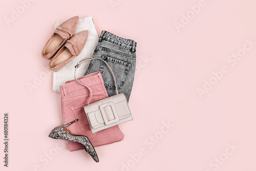 Jeans, handbag and  loafers. Fashion spring, summer or autumn outfit. Women's stylish and elegant clothes with accessory.  Flat lay, top view, overhead.