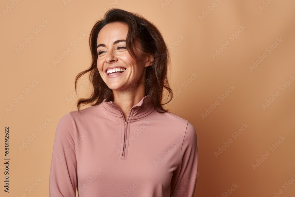 Portrait of a blissful woman in her 30s wearing a thermal fleece pullover against a pastel brown background. AI Generation Portrait of a blissful woman in her 30s wearing a thermal fleece pullover against a pastel brown background. AI Generation