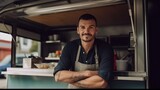 Portrait of a caucasian man cook seller of a street food truck, inside of food truck with crossed arms