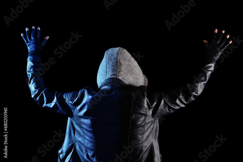 Fotografie Gangster with arms in the air