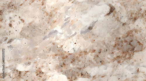 Seamless beige granite texture with quartz and feldspar spots photo