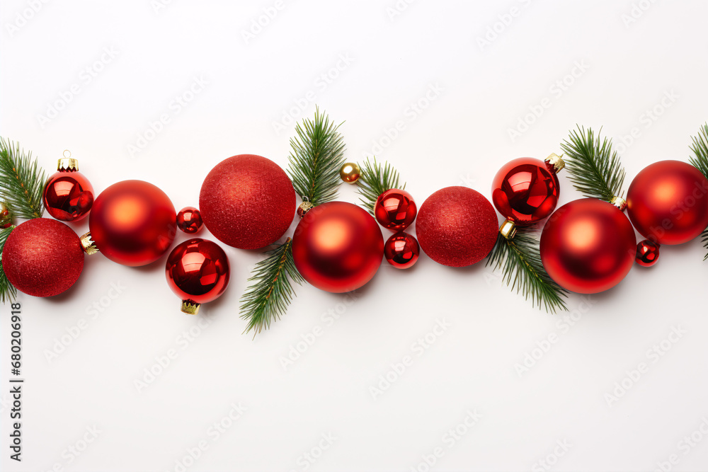 A festive flat lay composition of red Christmas balls, fir branches and snowy backdrop is ideal for winter and New Year's celebrations. A festive flat lay composition of red Christmas balls, fir branches and snowy backdrop is ideal for winter and New Year's celebrations.