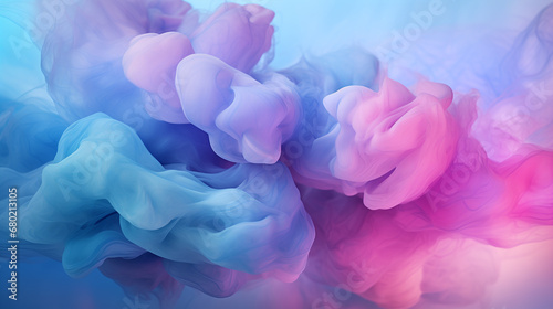 Soft billows of pink and blue smoke dance together in a delicate, fluid motion, creating a romantic and serene abstract backdrop © udomsin singjam