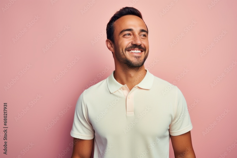Portrait of a happy man in his 30s wearing a sporty polo shirt against a pastel or soft colors background. AI Generation Portrait of a happy man in his 30s wearing a sporty polo shirt against a pastel or soft colors background. AI Generation
