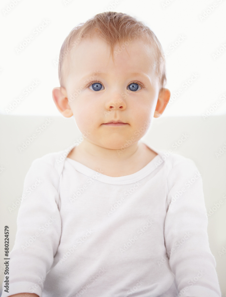 Home, bed and portrait of baby relax, resting and calm in nursery for sleeping or wake up in morning. Family, youth and face of infant newborn in bedroom for child development, growth and wellness