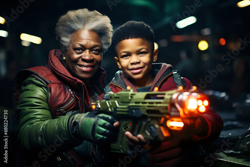 black grandmother and grandson play fictional fantasy intergalactic wars, grandmother plays interesting games for her grandson - the coolest grandmother in the world for her grandson