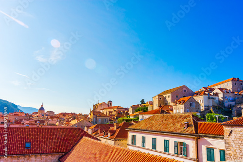 Aerial view of the red tiles and building roofs old city Dubrovnik in a beautiful summer day, Croatia. Blue sea with beautiful landscape, aerial view, Dubrovnik, Croatia