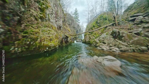 fov drone flying above ognon river and waterfall in Vosges region France photo