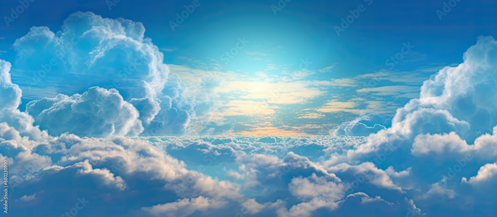 The abstract background of the summer sky showcases the beauty of nature, as the light dances through the white clouds, creating a stunning display of blue hues. The abstract background of the summer sky showcases the beauty of nature, as the light dances through the white clouds, creating a stunning display of blue hues.