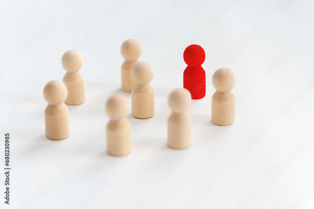 People stand in a circle on a white background. Communication. Business team, teamwork, team spirit. Wooden figures of people. A circle of people. discussion, cooperation, cooperation. Selective focus People stand in a circle on a white background. Communication. Business team, teamwork, team spirit. Wooden figures of people. A circle of people. discussion, cooperation, cooperation. Selective focus