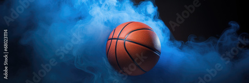 panorama banner with basketball ball in the center on a blue smoke background 