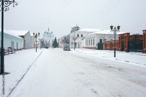 Yelabuga in winter. Snow-covered street with a view of the Spassky Cathedral. Copy space. © ROMAN DZIUBALO