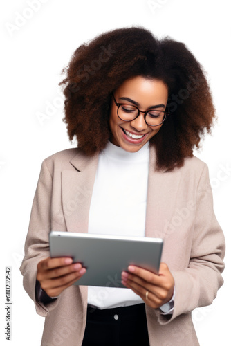 Portrait of a happy beautiful african american woman smiling and looking at a tablet isolated on transparent background. png