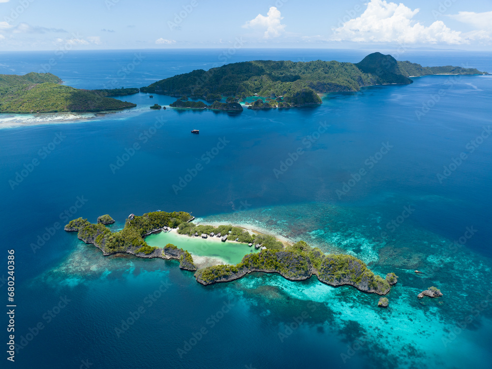 Idyllic Rufas Island, near Penemu in Raja Ampat, is surrounded by healthy corals and open ocean. This island, as well as those in the region, support some of the highest marine biodiversity on Earth.