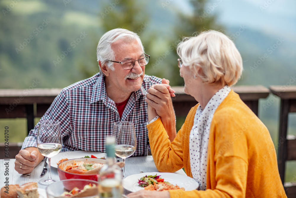 Senior Couple Enjoying Outdoor Dining