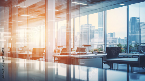 Beautiful blurred background of a light modern business office interior with panoramic windows and bright lighting	