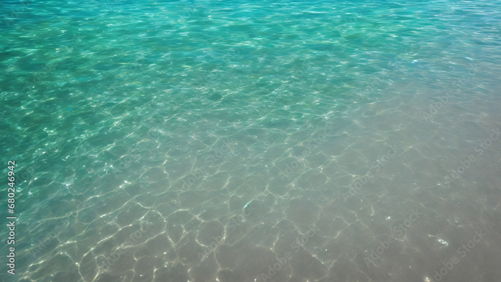 Summer clear water, shore, beach, sunlight, ripple reflection, transparency