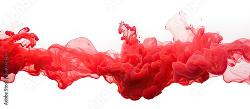 In a digital design, a red cloud emerges from a pool of liquid ink, creating an abstract pattern against a white background, isolated from the concept of water and showcasing an intriguing texture.