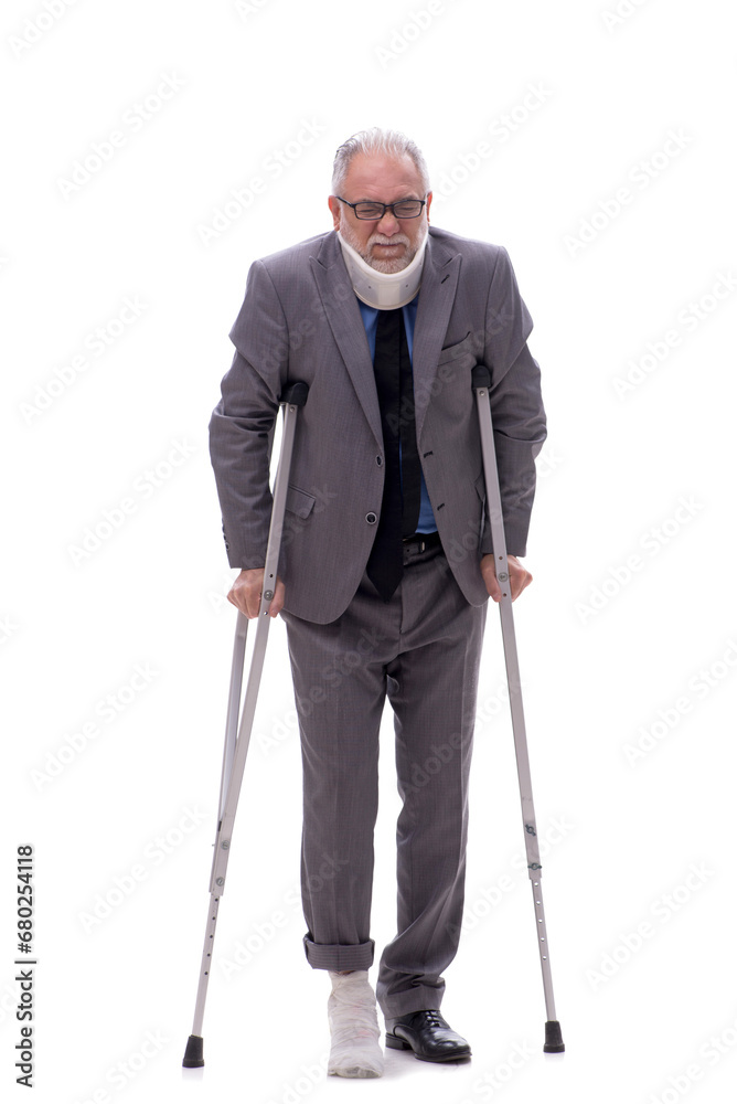 Old businessman after car accident isolated on white Old businessman after car accident isolated on white