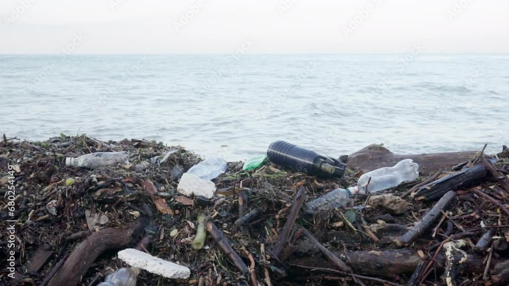 Pollution of the ocean coast by plastic waste. Pollution of the ocean coast by plastic waste.