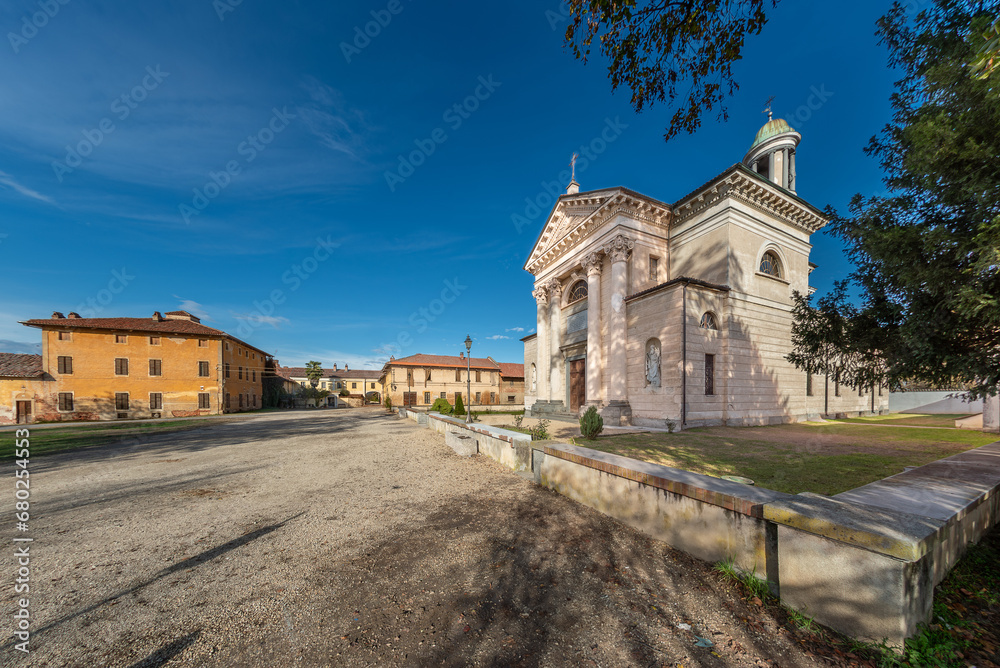 Villastellone, Turin, Italy - November 18, 2023: Borgo Cornalese with the Beata Vergine dei Dolori Church and ancient farmsteads
