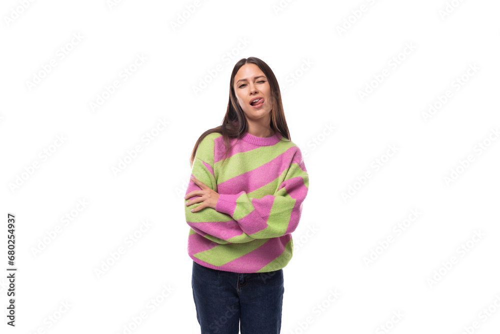 portrait of a young slender well-groomed caucasian woman with black hair dressed in a pink striped jacket on a white background with space for advertising portrait of a young slender well-groomed caucasian woman with black hair dressed in a pink striped jacket on a white background with space for advertising