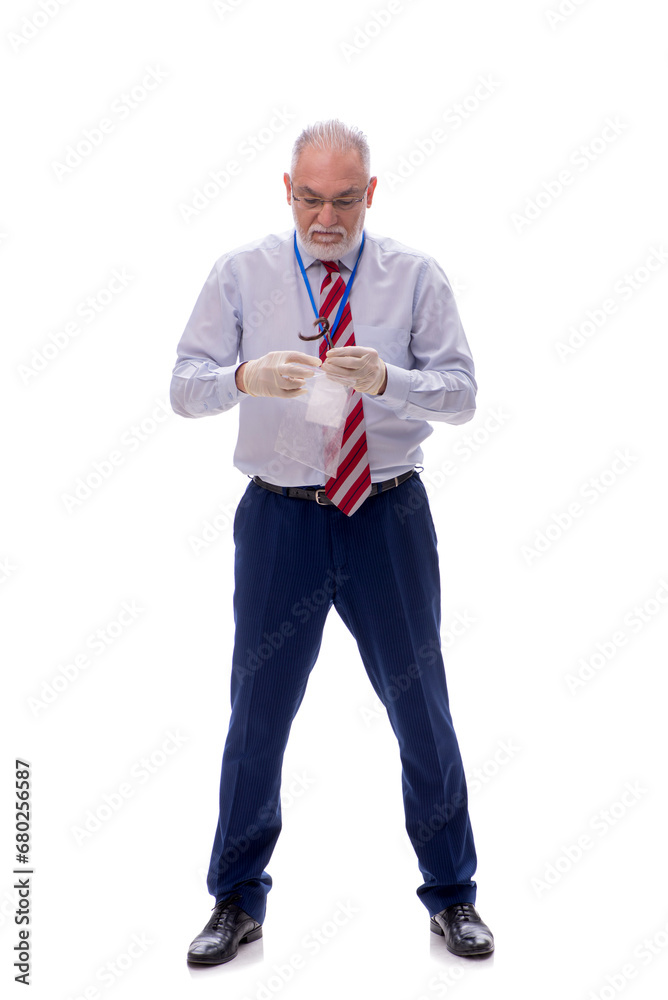 Old criminologist isolated on white Old criminologist isolated on white