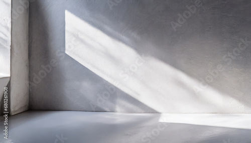abstract background from white concrete wall with sunlight light and shadow
