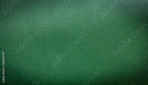 vintage green leather background texture surface of leatherette use for background mood and toned for interior material background photo