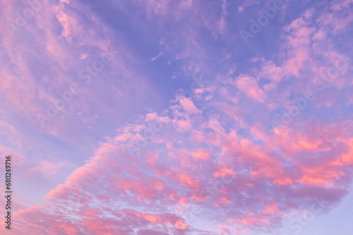 Photography Sunrise, sunset pink blue sky with many little clouds background texture