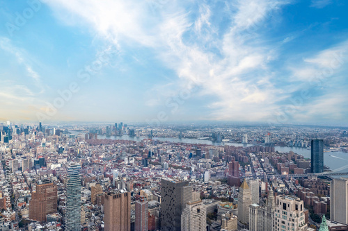 Immerse yourself in the New York skyline  a perfect fusion of architecture and ambiance. This captivating aerial view  shows the beautiful Hudson River and realestate of New York City 