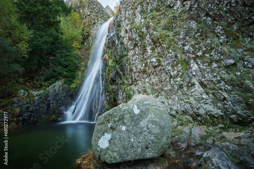Waterfall called Poco do Inferno with water pool during autumn time, Manteigas, Serra da Estrela, Portugal photo