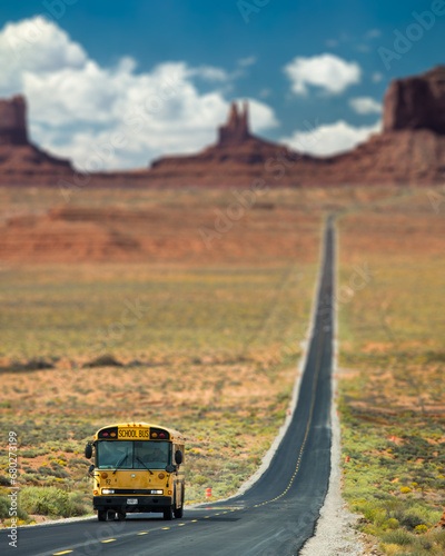 Americana roadtrip Monument Valley wild west in a yellow school bus