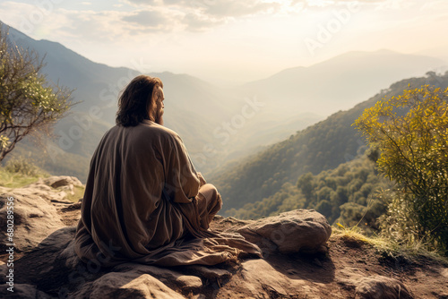 Jesus Christ prays alone in the mountains in the morning