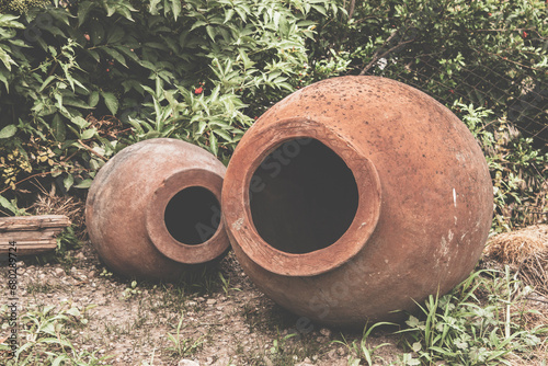 traditional Georgian ceramic jug for wine as decorated in Telavi's garden, Georgia (Sacartvelo) 2019 photo
