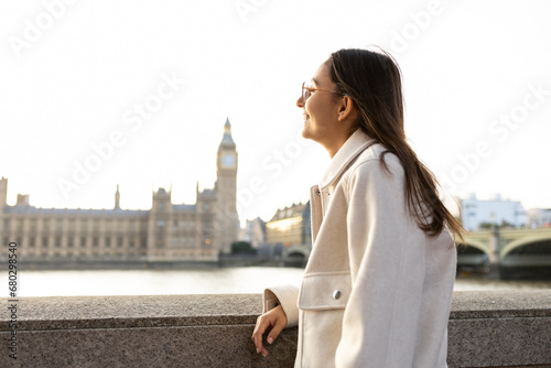 Woman enjoying the view of London's iconic skyline photo