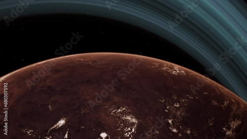 Red rocky desert Mars like planet with orbiting rings. Thin atmosphere and clouds. 3D animation concept of alien terran world. Barren and dry conditions. Drought ecosystem in extreme hot climate.