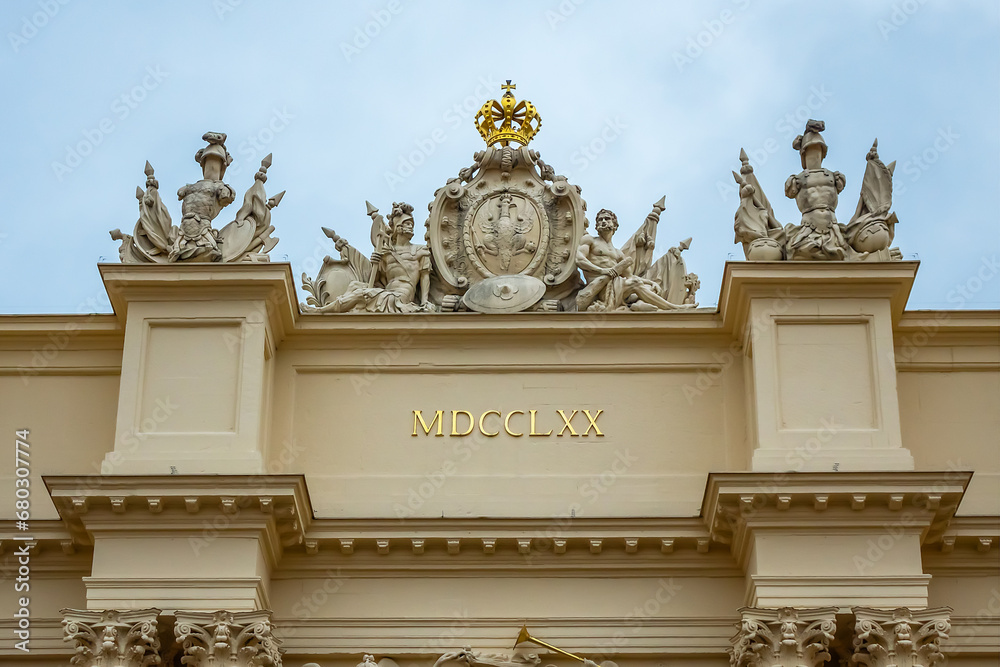 Beautiful ornate Brandenburg Gate (Brandenburger Tor, from 1771) was built in Roman style on the Luisenplatz in Potsdam old city center. POTSDAM, GERMANY. Beautiful ornate Brandenburg Gate (Brandenburger Tor, from 1771) was built in Roman style on the Luisenplatz in Potsdam old city center. POTSDAM, GERMANY.