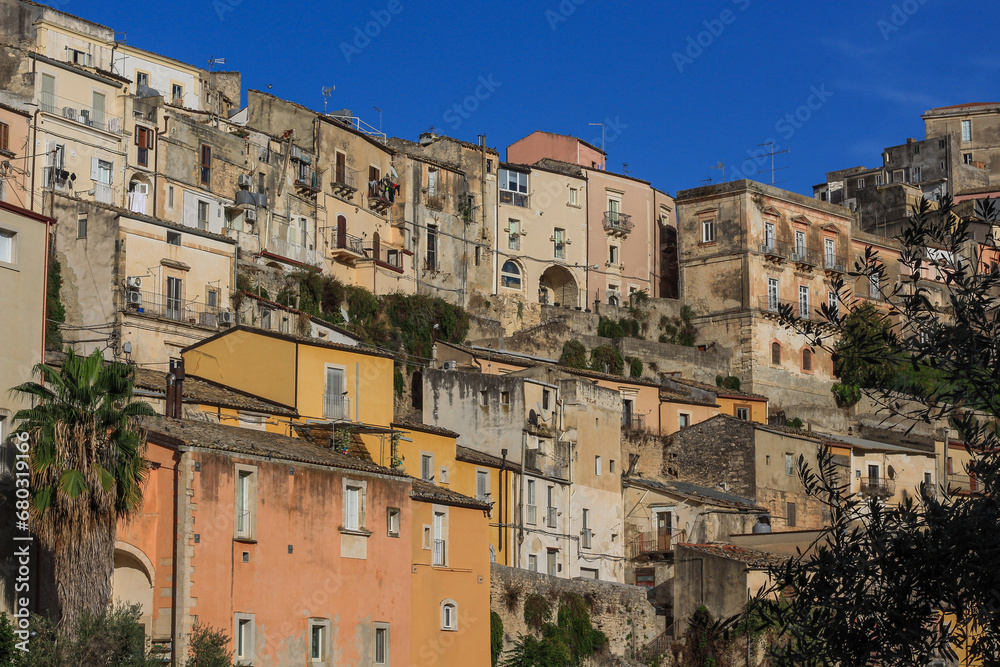 Beautiful panorama of the old Sicilian city, view of Ragusa Ibla, Italy, traveling in Italy, old architecture on a hill, typical Sicilian buildings, no people.