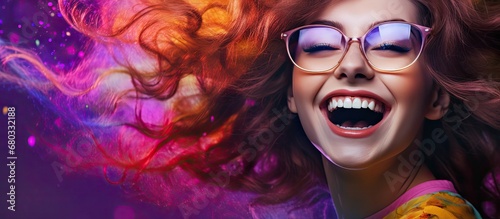 The stunning woman with a contagious smile showcases her creativity through her colorful makeup, capturing her beauty in a captivating portrait. This happy girl, wearing glasses, exudes confidence as