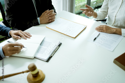 law firm lawyers are meeting to find out the legal planning guidelines photo