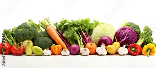 The set of colorful and healthy vegetables isolated in a white background creates a vibrant collage representing the natural and organic nutrition found in plant-based foods, rich in vitamins and