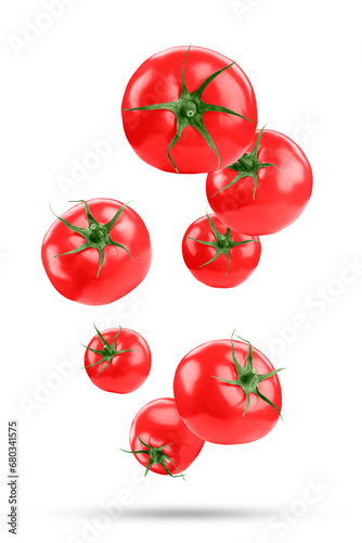 Fresh ripe tomatoes falling on white background